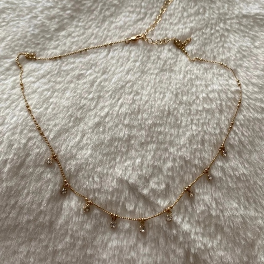 Gold rhinestone dangle charm necklace